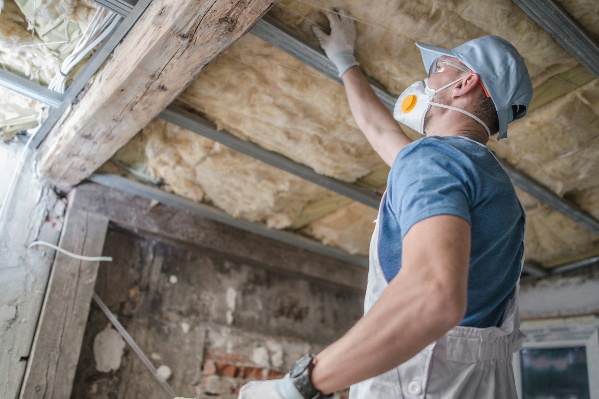 A worker wearing a mask