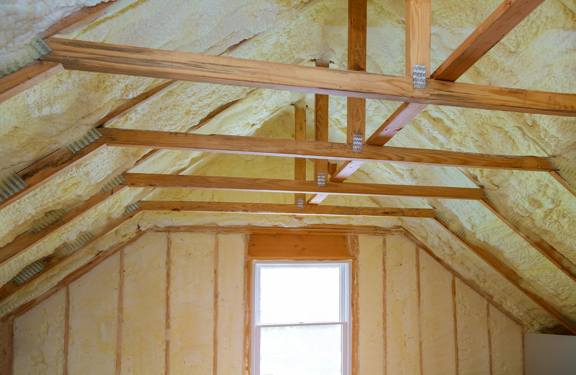 A photo of an attic with insulation